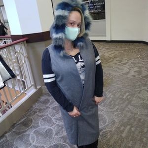 Sleeveless dress coat